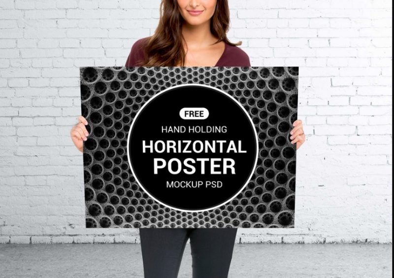 Woman Holding Horizontal Poster Mockup PSD