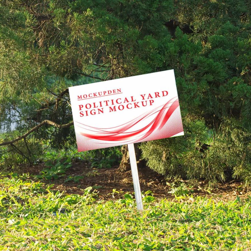 Free Political Yard Sign Mockup on green grass and with trees in the background